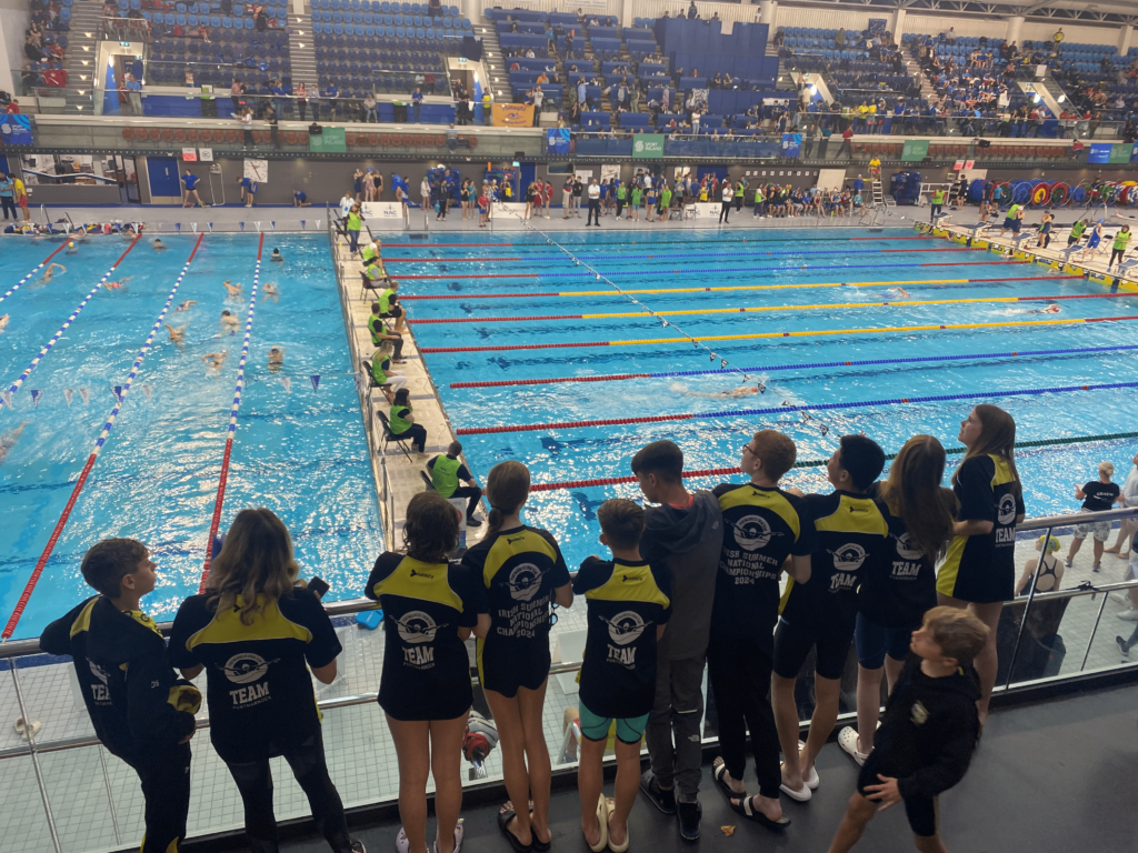 alt="Swimmers of the PST at a swim gala, 2026."